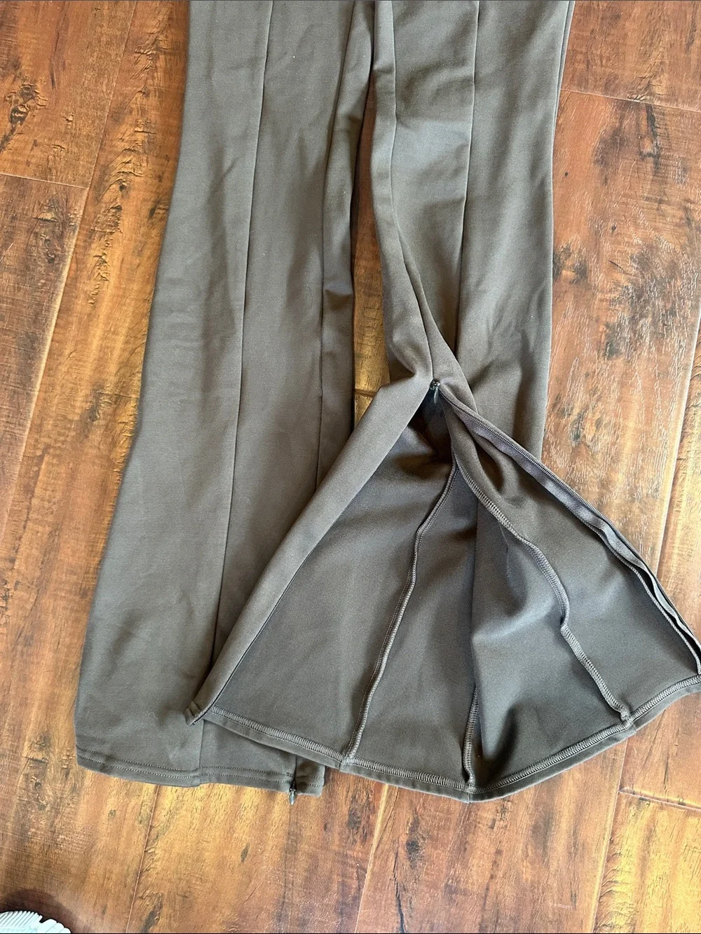 ALO Yoga Women’s Flared Leggings in Dark Olive